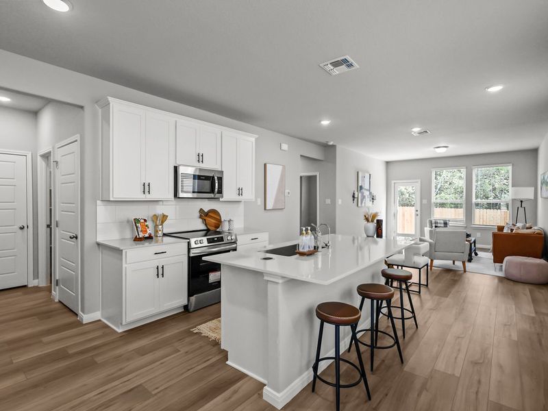 Furnished interior in a model home at Buffalo Way Villas in Houston (Image 4).