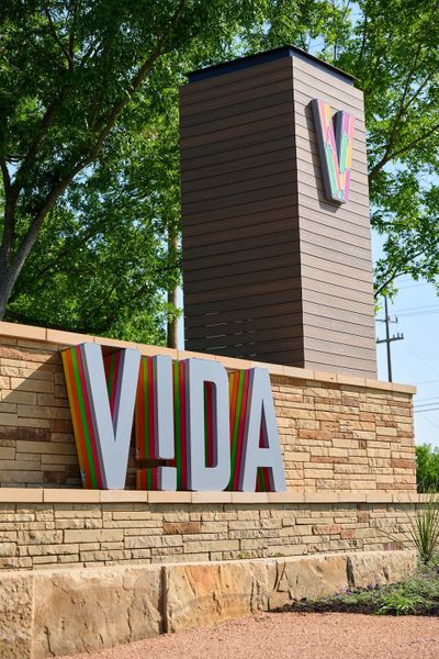 Entrance to the VIDA community in San Antonio, TX, featuring signage and landscaping (Image 16).