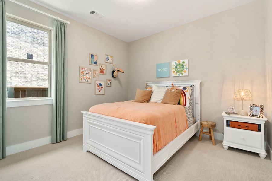 Plan 1685 Secondary Bedroom Representative Photo by American Legend Homes