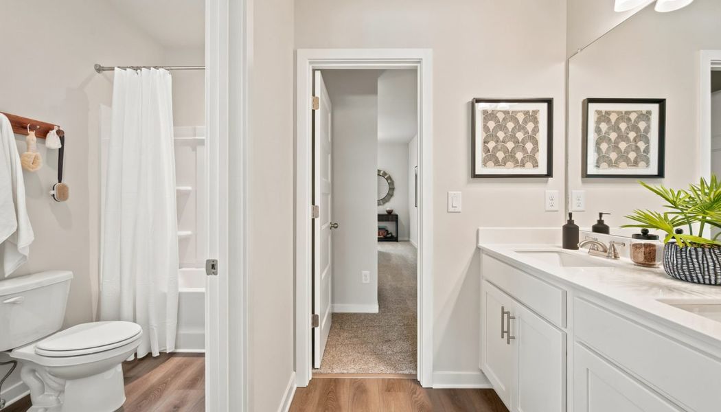 Furnished interior in a model home at Fowler Farms in Auburn (Image 102).