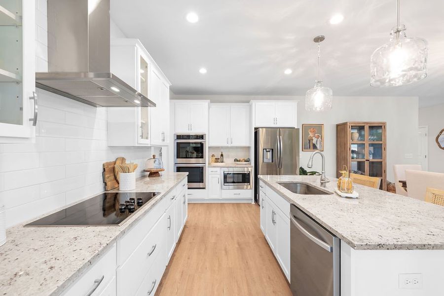 Furnished interior in a model home at Ramsey Landing in Rincon (Image 12).