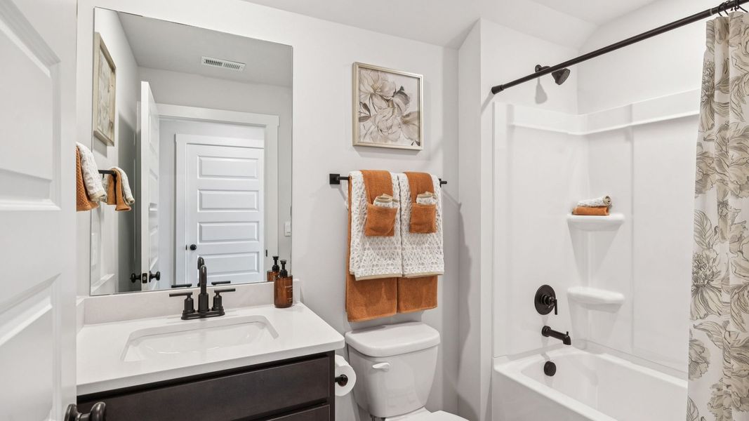 Furnished interior in a model home at Harvest Point in Spring Hill (Image 67).