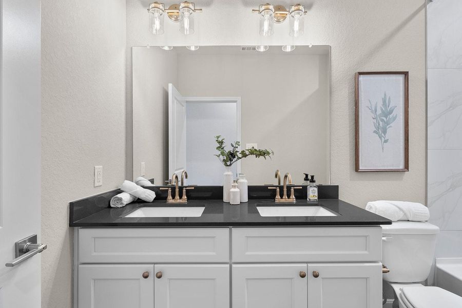 Furnished interior in a model home at Friedrich Hill in San Antonio (Image 57).