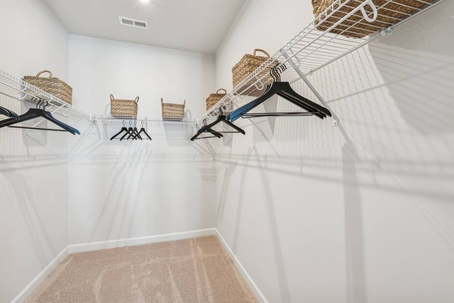 Furnished interior in a model home at Mews at Holding Village in Wake Forest (Image 59).