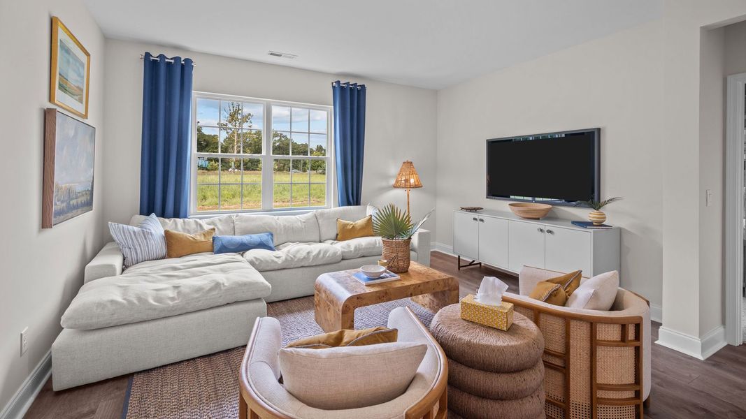 Furnished interior in a model home at Tyler - Home on the Lake in New Bern (Image 5).