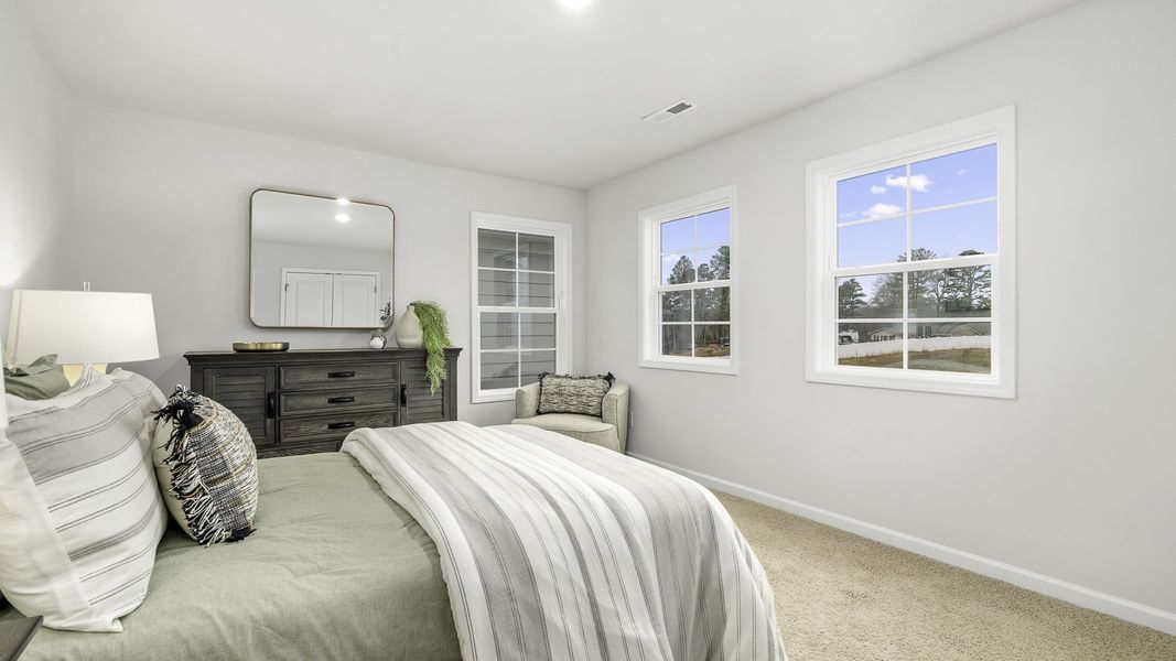 Furnished interior in a model home at Lybrook Village in Bermuda Run (Image 23).