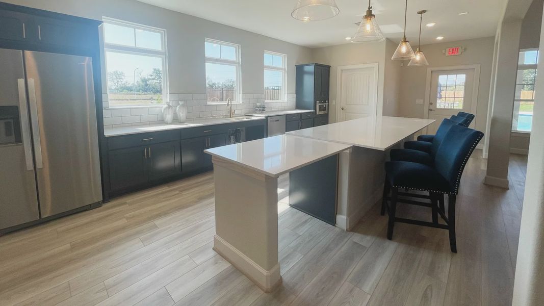 Furnished interior in a model home at Winfrey Estates in Tomball (Image 7).