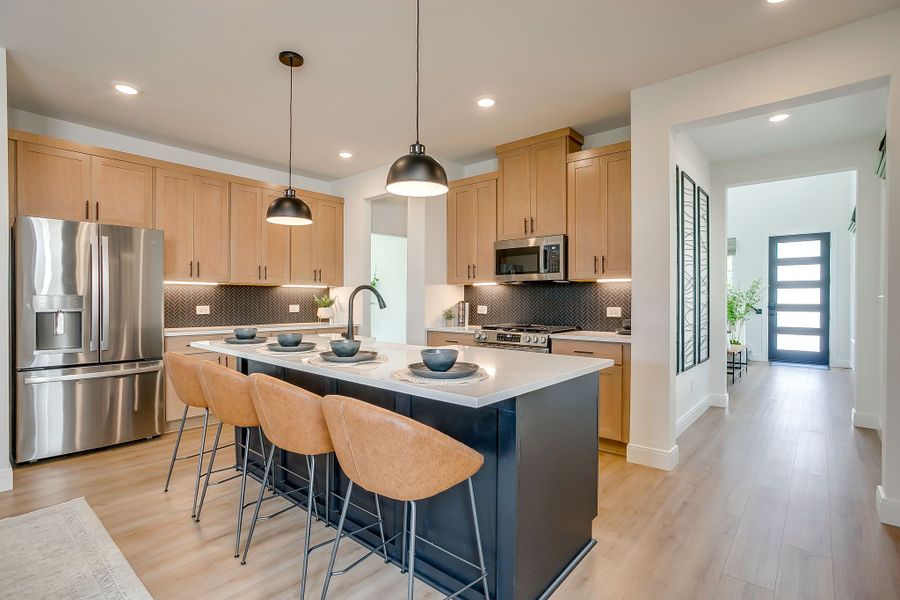 Furnished interior in a model home at Creekside in Royse City (Image 8).