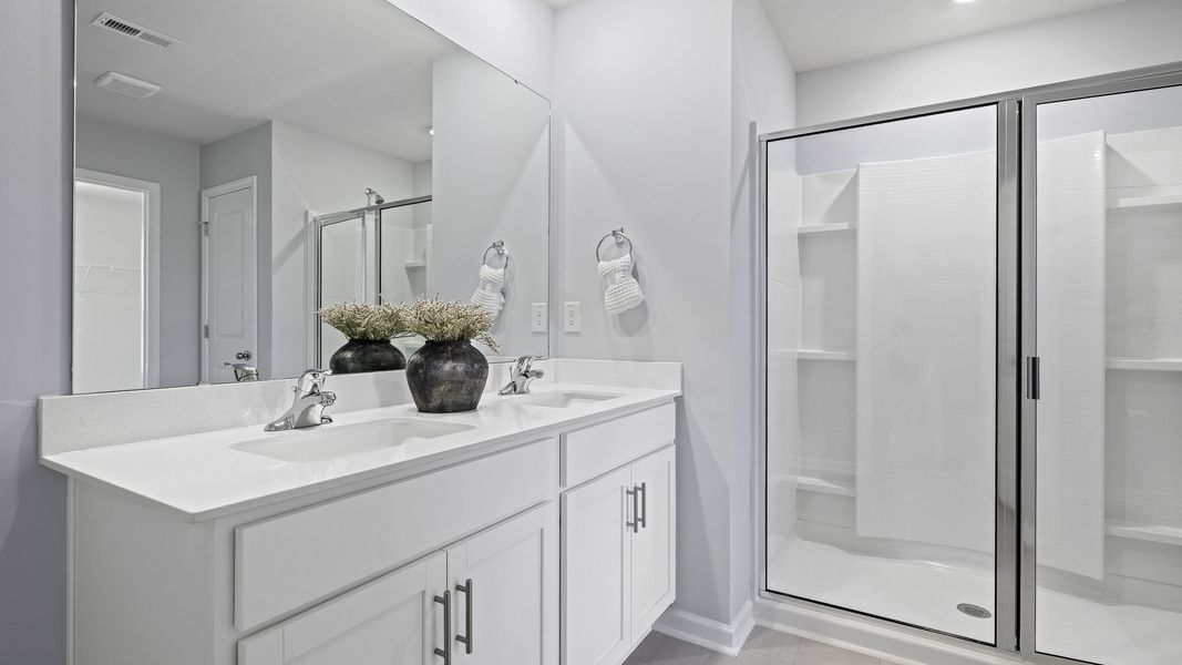 Furnished interior in a model home at The Preserve at Kinsley in Jamestown (Image 13).