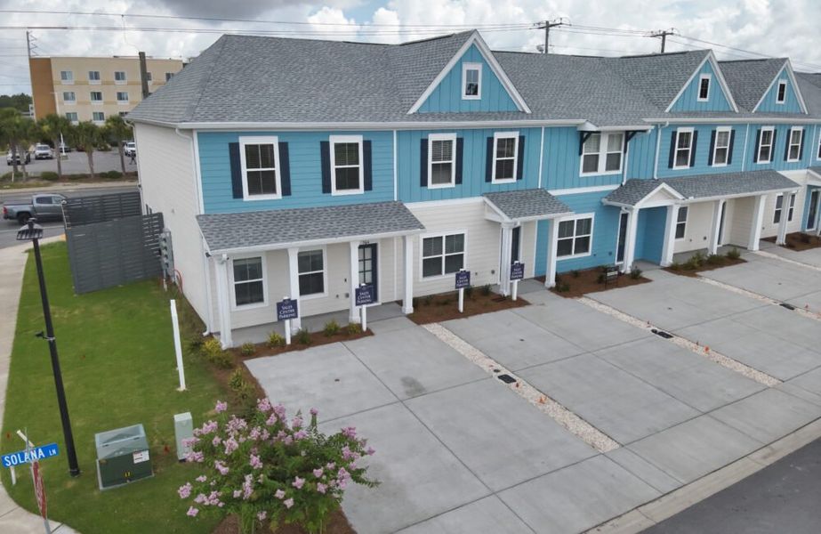 Front exterior of a home in the Waypoint Townhomes community, located in Panama City Beach, FL (Image 3).