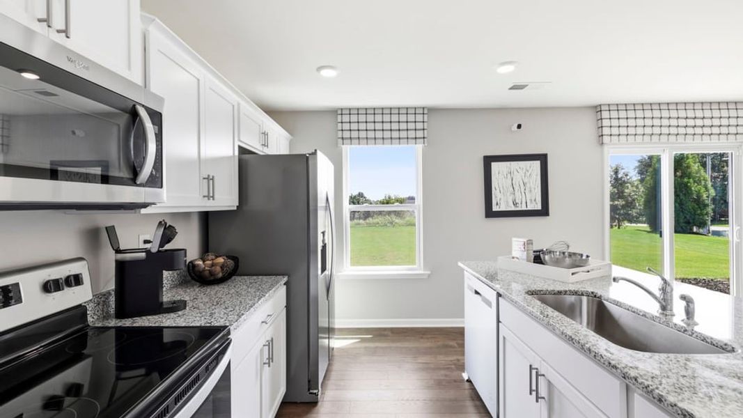 Furnished interior in a model home at Treemont Commons in Wellford (Image 20).