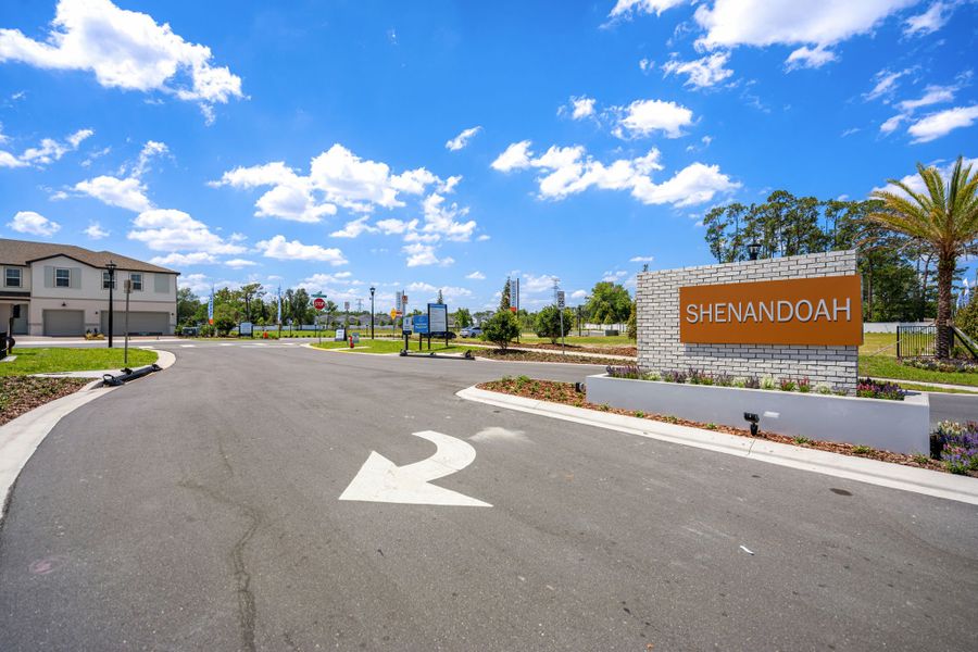 Entrance to the Shenandoah Reserve community in Orlando, FL, featuring signage and landscaping (Image 13).