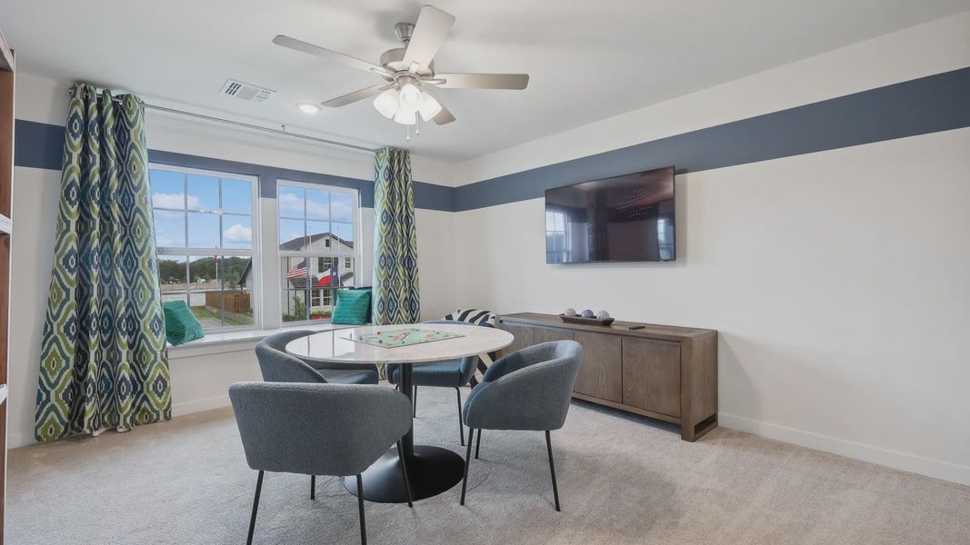 Luxurious living space with large windows boasts plush furnishings and stylish modern design in Churchill community. Luxurious living space with large windows boasts plush furnishings and stylish modern design in Churchill community.