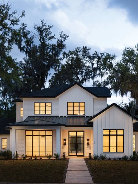 Front exterior of a home in the The Grove community, located in Oakland, FL (Image 5).