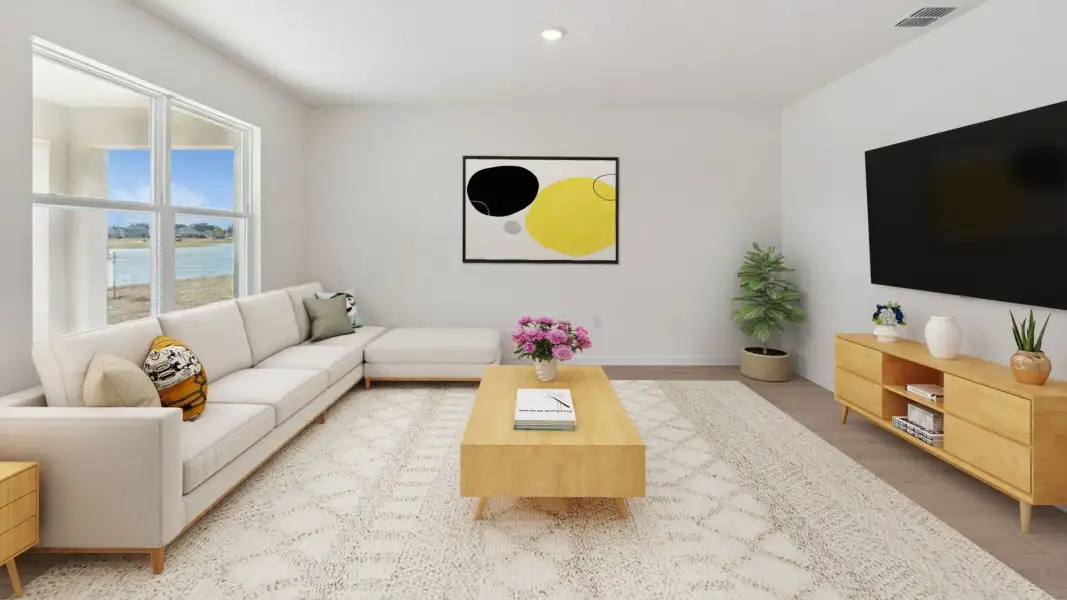 Furnished interior in a model home at Travis Landing in Kissimmee (Image 12).