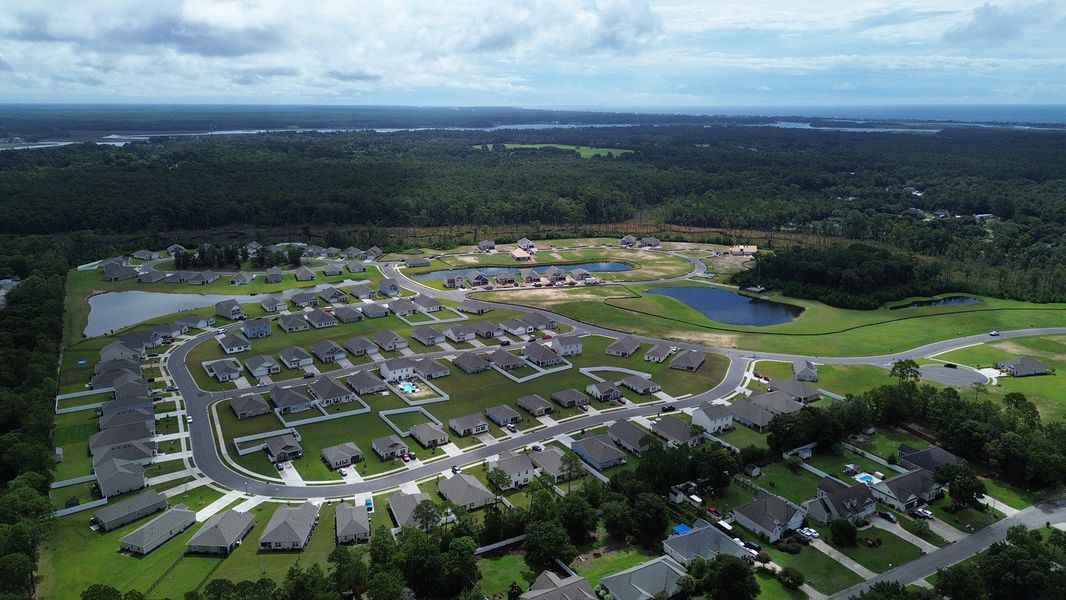 Aerial view of the Stanbury Creek community in Supply, NC, showing layout and nearby surroundings (Image 11). Aerial view of the Stanbury Creek community in Supply, NC, showing layout and nearby surroundings (Image 11).