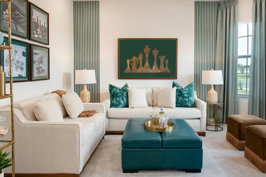 Furnished interior in a model home at Highfield at Twisted Oaks in Wildwood (Image 36).