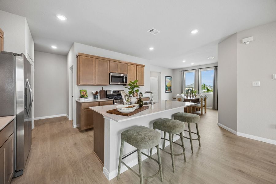 Kitchen in the Oak Model Home by Trophy Signature Homes