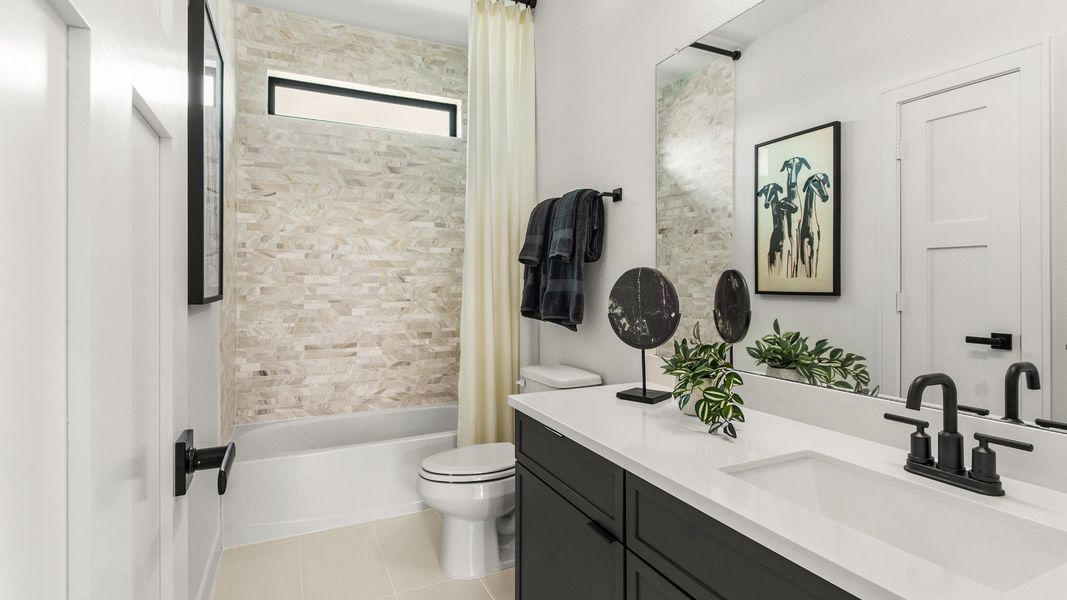 Furnished interior in a model home at Bridgeland Central in Cypress (Image 7).