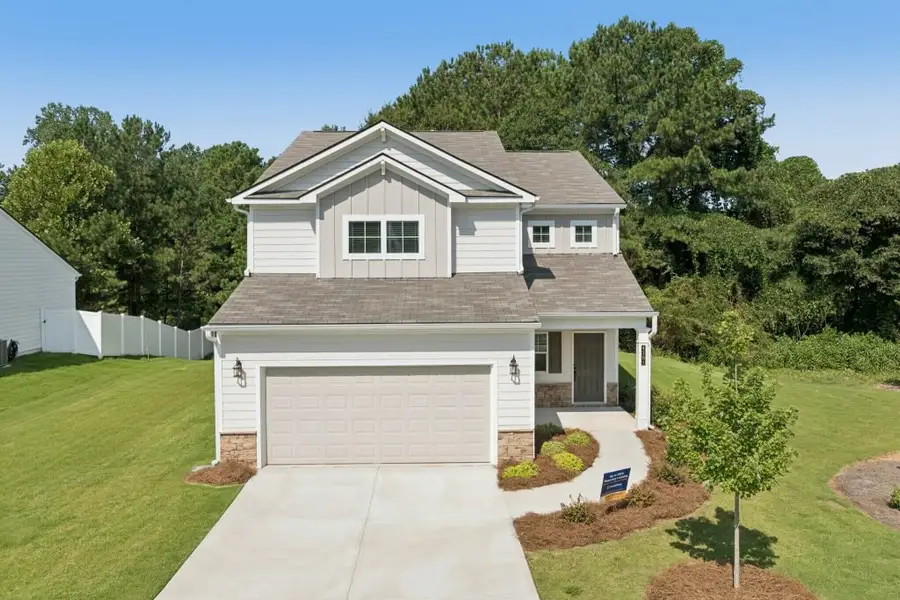 Front exterior of a home in the The Reserve at Chapel Hill Phase II community, located in Douglasville, GA (Image 4).
