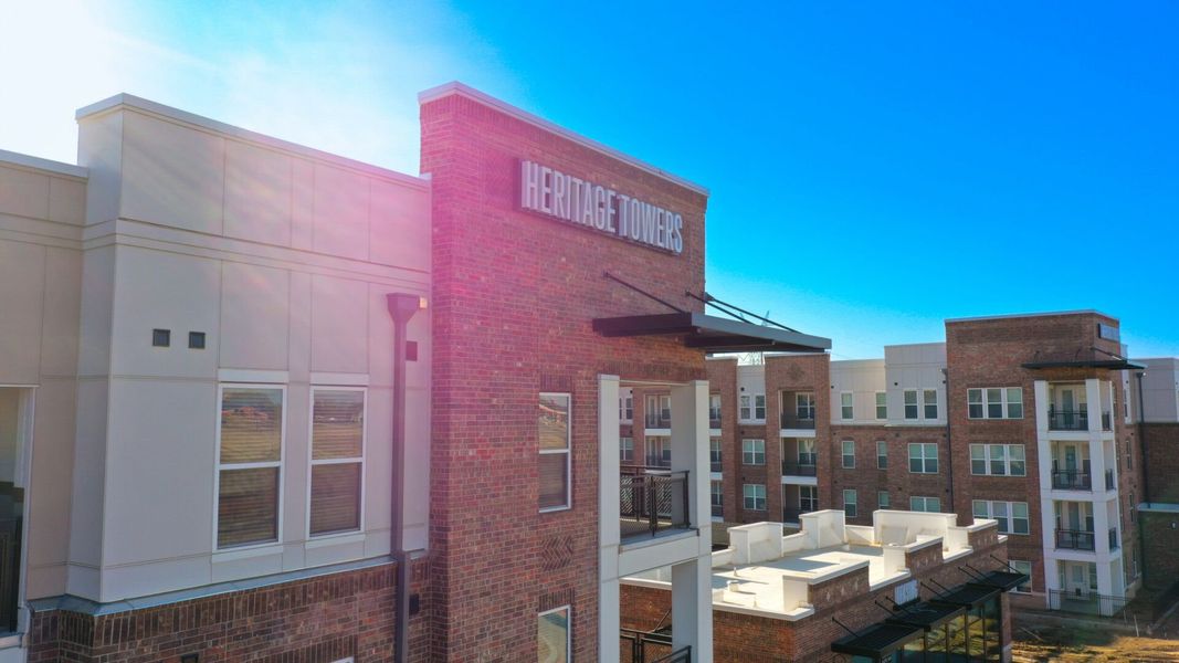 Front exterior of a home in the Heritage Towers community, located in Lewisville, TX (Image 7).