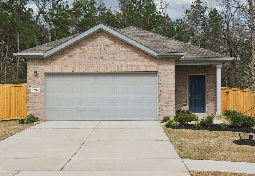 Front exterior of a home in the Wayside Village community, located in Houston, TX (Image 8).