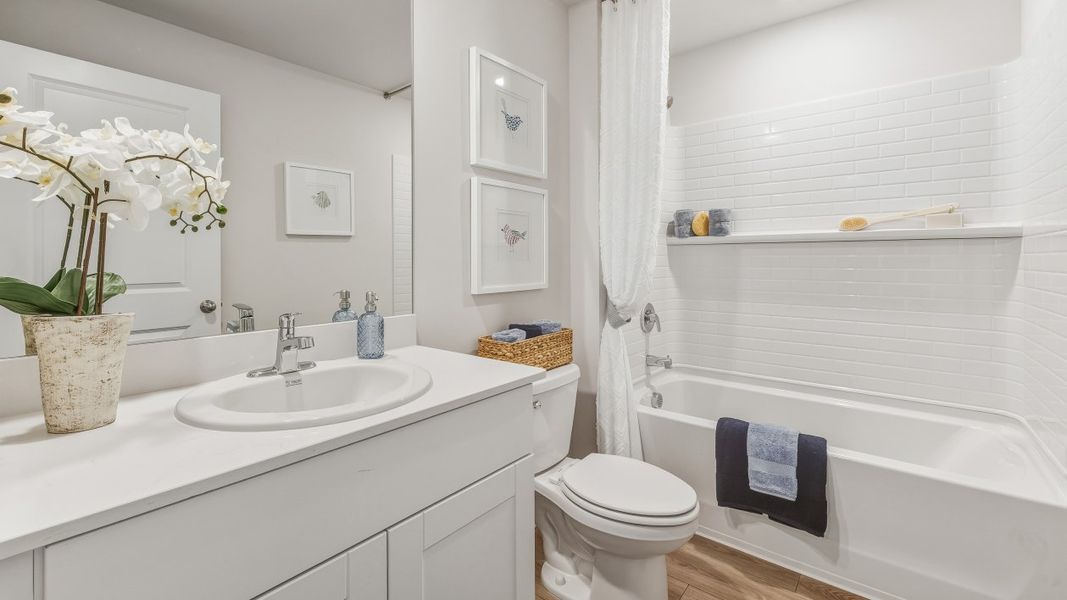 Furnished interior in a model home at Coral Lakes - Tradition & Express in Punta Gorda (Image 25).