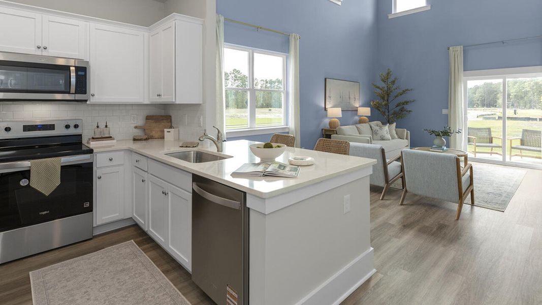 Furnished interior in a model home at The Palms at Indigo Preserve Townhomes in Leland (Image 15).