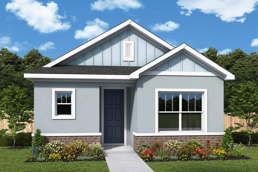 Front exterior of a home in the Palmeras at Crossprairie – The Magnolia Collection community, located in St. Cloud, FL (Image 3).