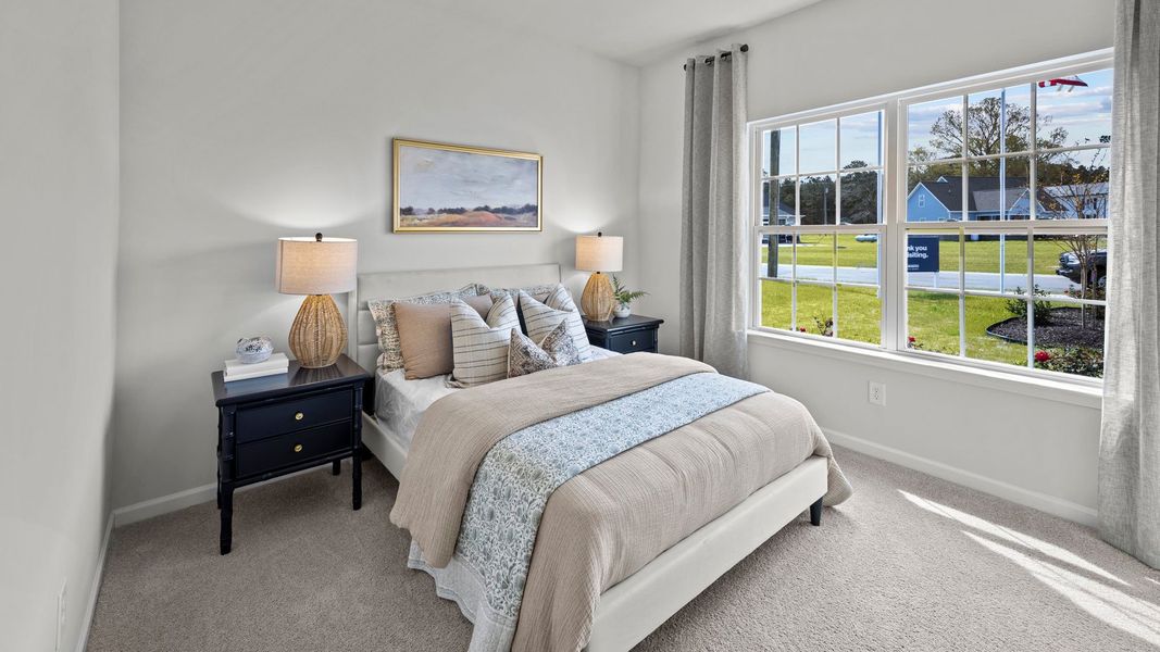 Furnished interior in a model home at East Ridge in Ayden (Image 12).