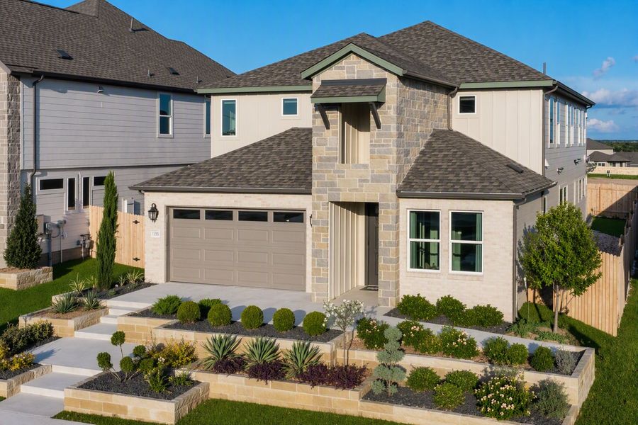 Front exterior of a home in the Turners Crossing community, located in Austin, TX (Image 2).