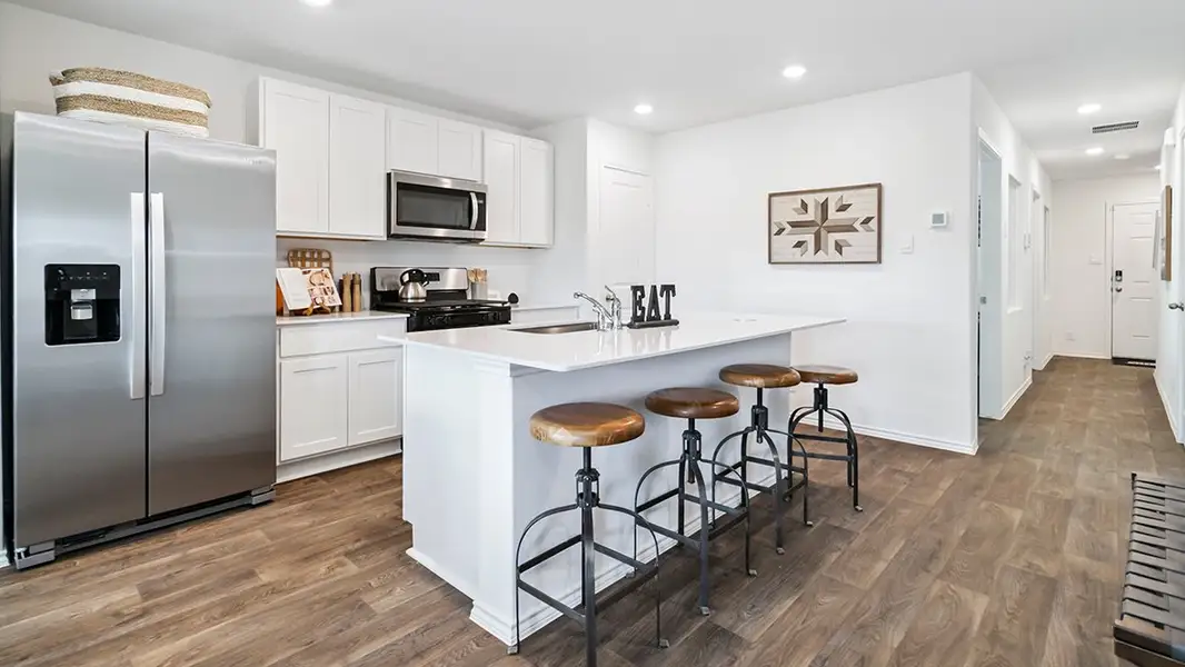 Furnished interior in a model home at Blue Ridge Ranch in San Antonio (Image 6).