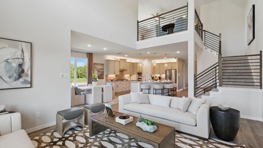 Experience modern elegance with a vaulted ceiling, open-plan kitchen, and chic staircase in Green Oaks Preserve. Experience modern elegance with a vaulted ceiling, open-plan kitchen, and chic staircase in Green Oaks Preserve.