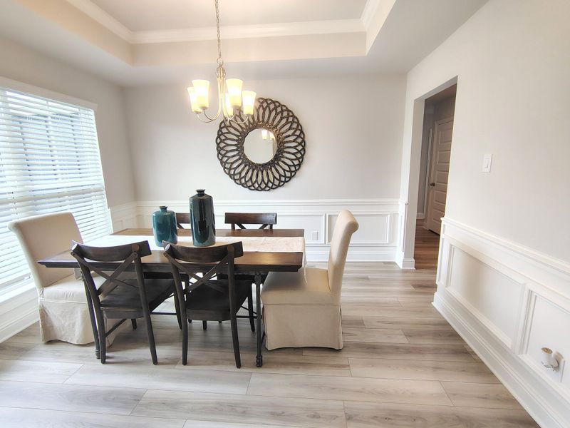 Furnished interior in a model home at Greystone in Angleton (Image 5).
