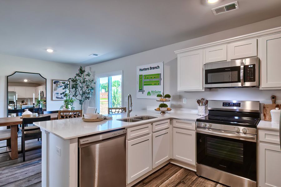 Furnished interior in a model home at Hunters Branch in Hopkins (Image 14).