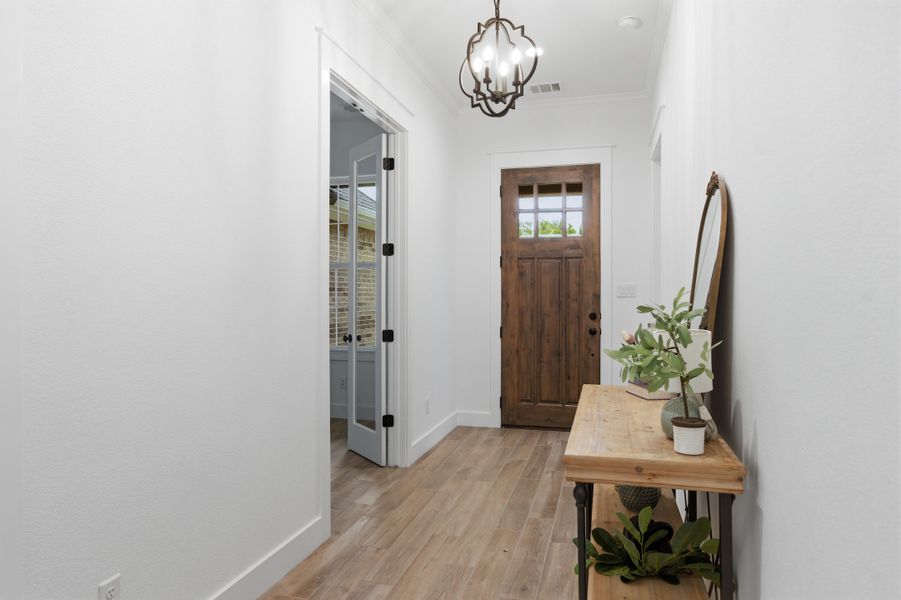 Furnished interior in a model home at Oakmont in Bryan (Image 8).