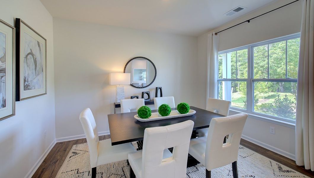 Furnished interior in a model home at Heritage Park in Fletcher (Image 5).