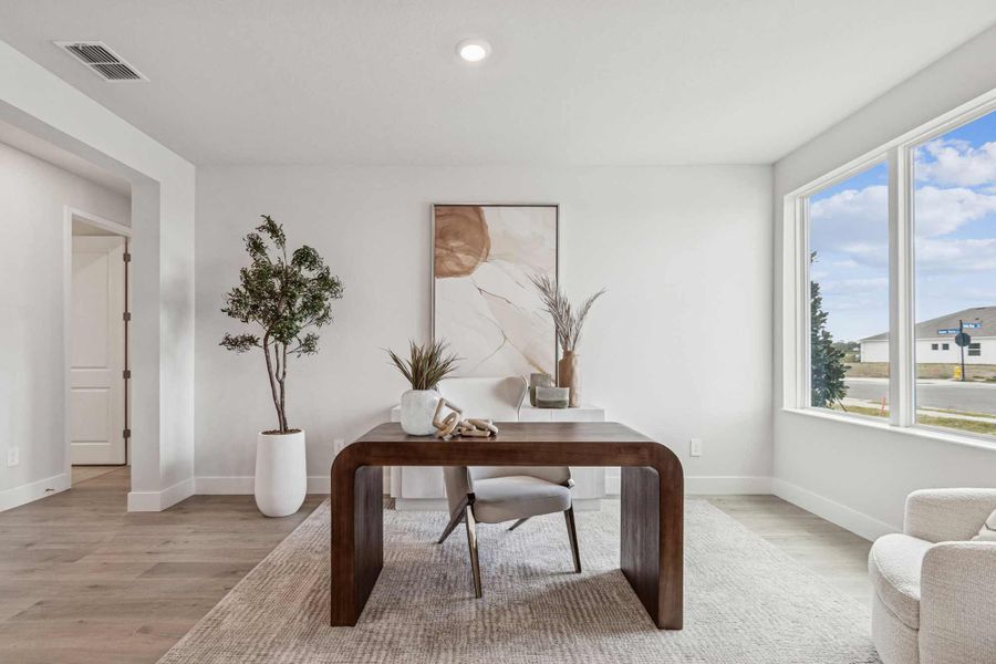 Furnished interior in a model home at Southwind – Executive Series in Plant City (Image 8).