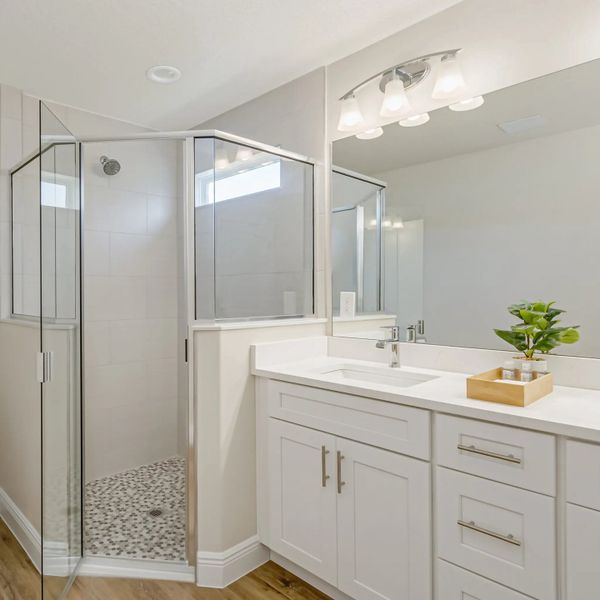 Furnished interior in a model home at Hidden Woods in Melbourne (Image 34).