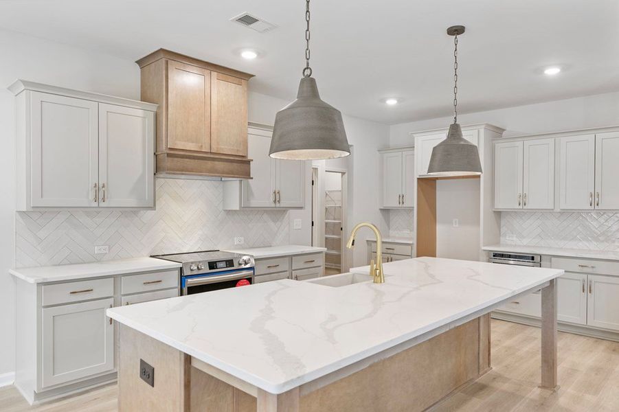 Furnished interior in a model home at Liberty Station in Bremen (Image 11).