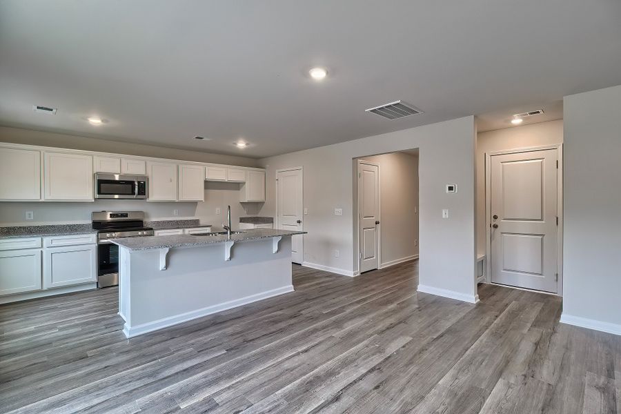 Furnished interior in a model home at Sibley Village in Sumter (Image 46).