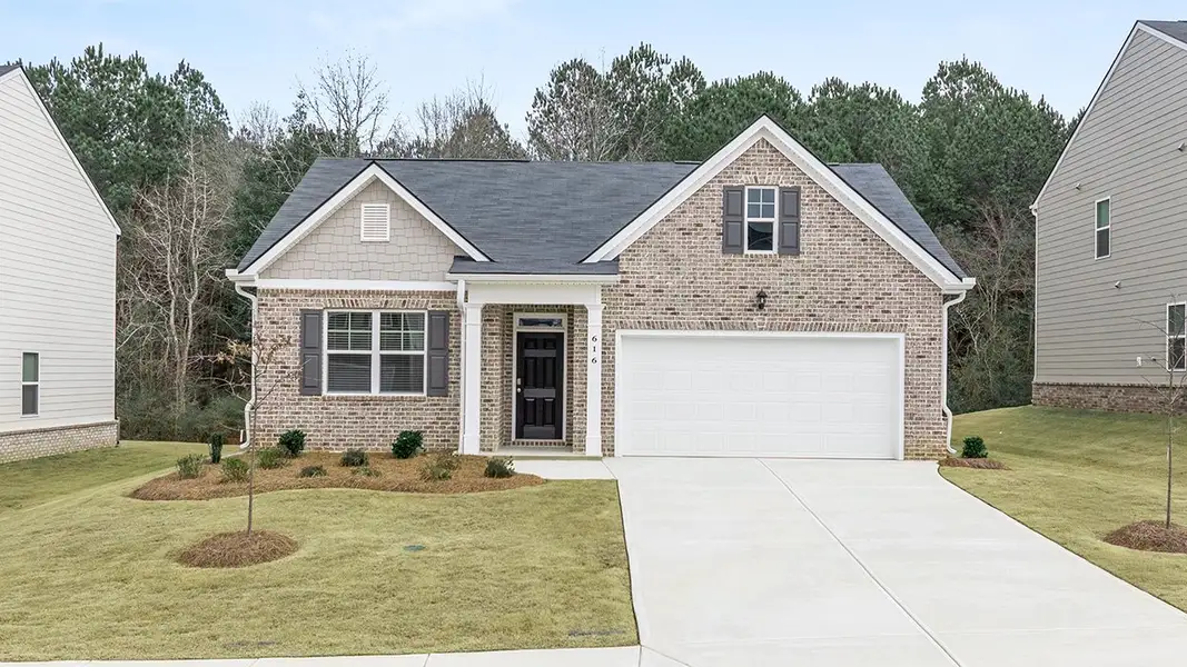 Front exterior of a home in the The Reserve at Calcutta community, located in Stockbridge, GA (Image 6).