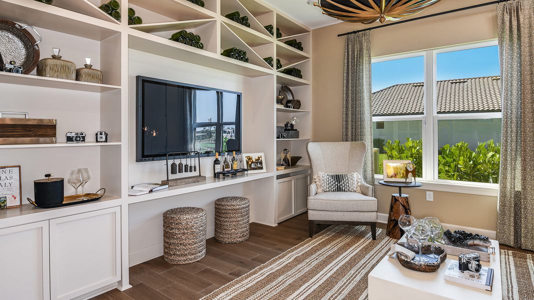 Furnished interior in a model home at Esplanade by the Islands in Naples (Image 76).