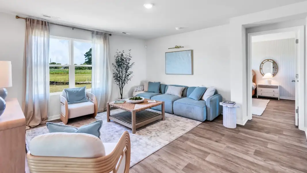 Furnished interior in a model home at Caspian Ridge in Richlands (Image 6).