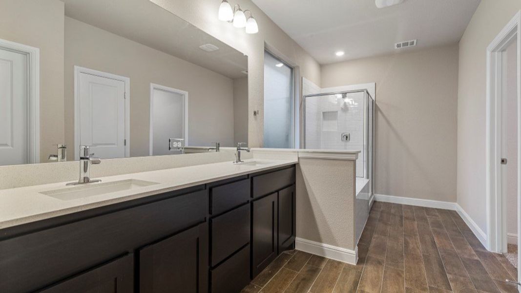Furnished interior in a model home at Eden Ranch in Arlington (Image 27).