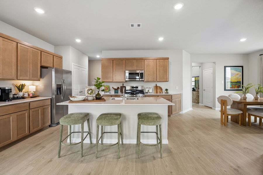 Kitchen in the Oak Model Home by Trophy Signature Homes