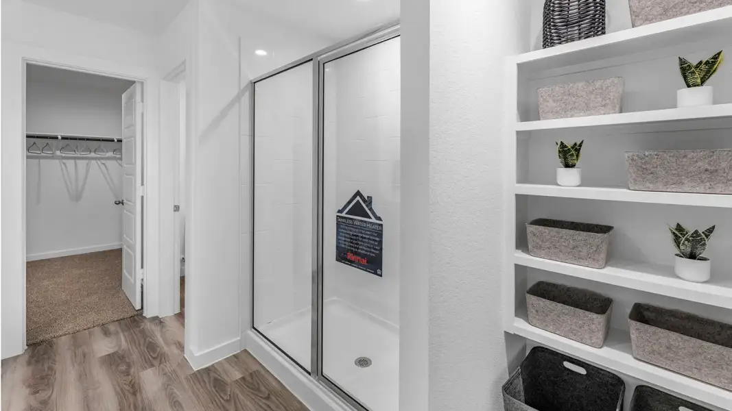 Furnished interior in a model home at Alexander Townhomes in Pearland (Image 18).