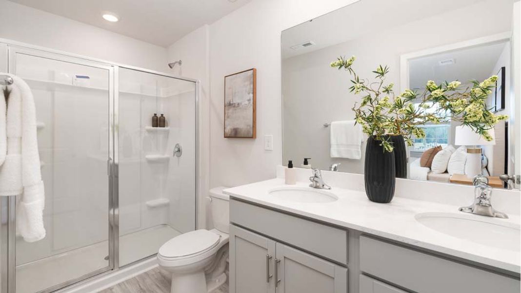 Furnished interior in a model home at The Townes at Troutman in Troutman (Image 13).