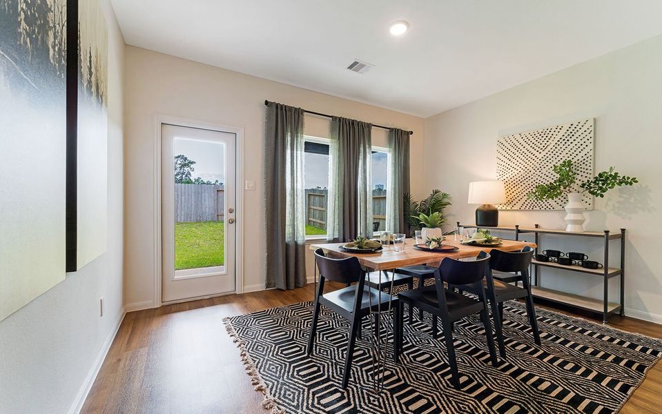 Furnished interior in a model home at The Pines at Seven Coves in Willis (Image 15).