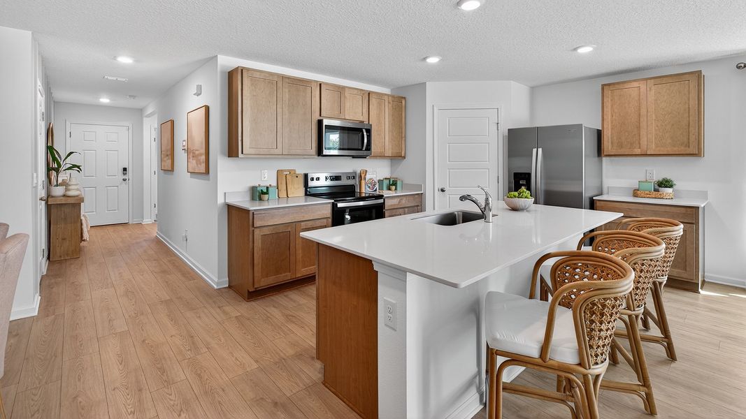 Furnished interior in a model home at Sawmill Branch Express in Palm Coast (Image 6).